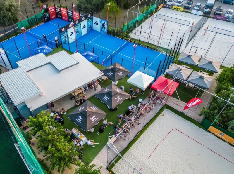 Aerial view of the beach volleyball and padel courts at 4 Sports Club in Chalandri